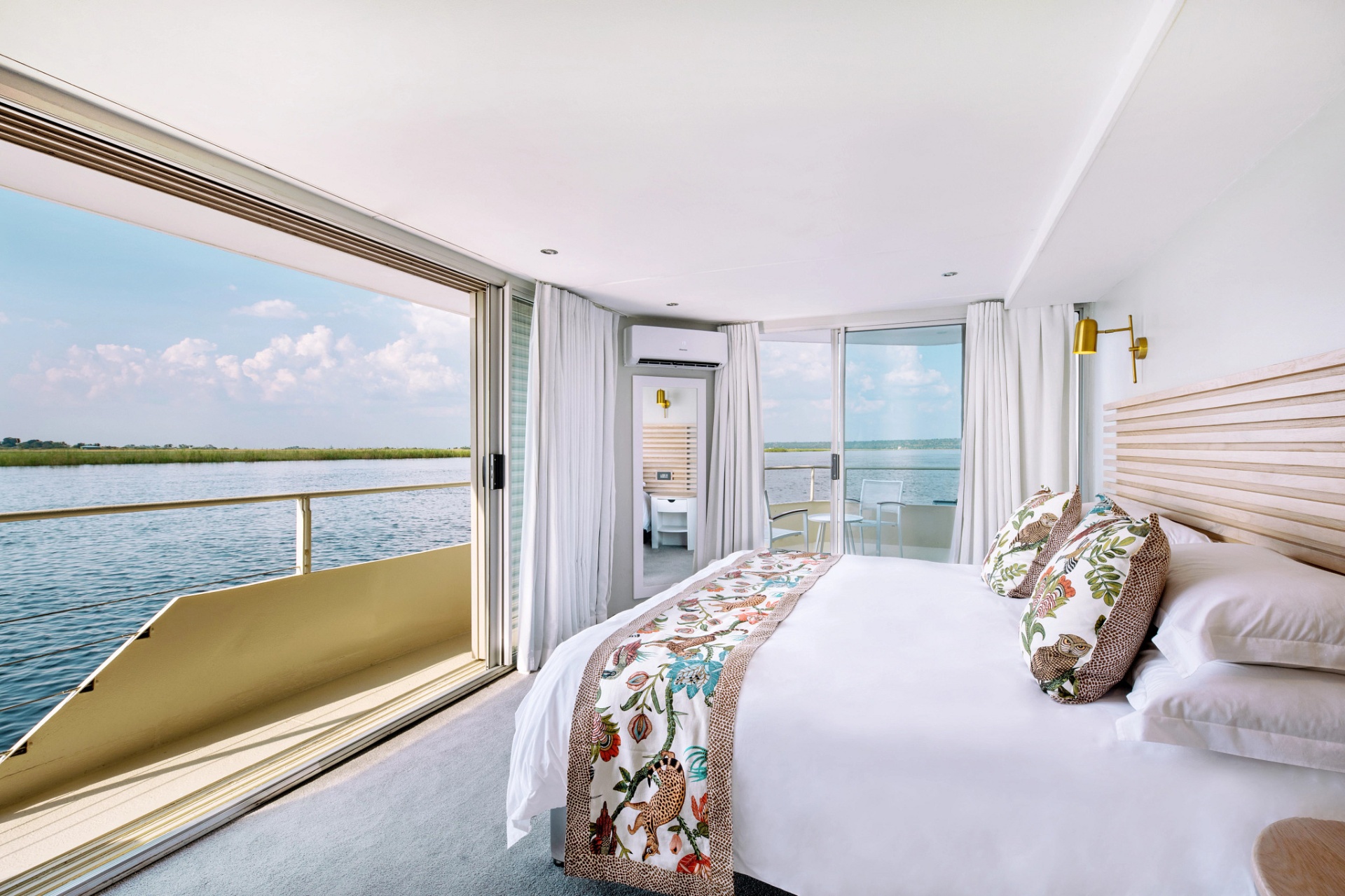 Luxury Suite with panoramic sliding glass to the river